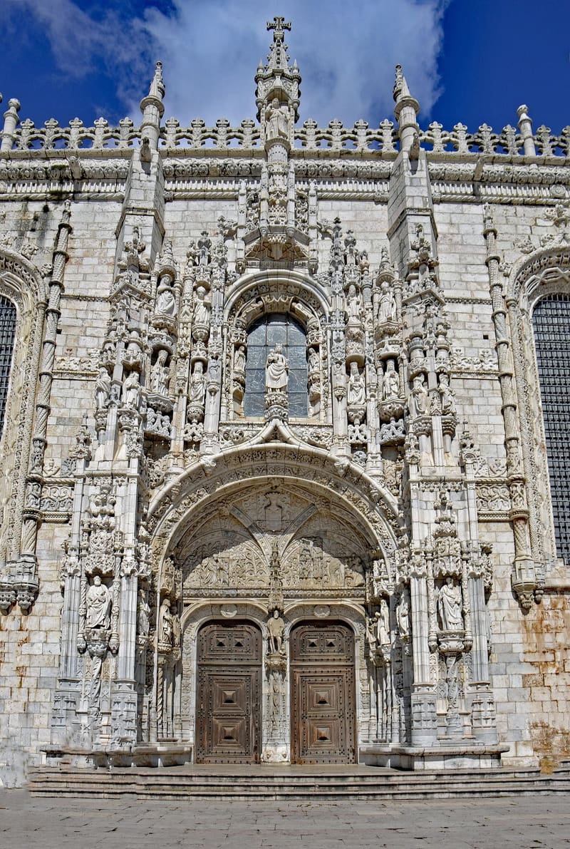 Interior of the Museu Nacional dos Coches in Belém showing the gilded Coach of the Oceans amongst other royal coaches.
